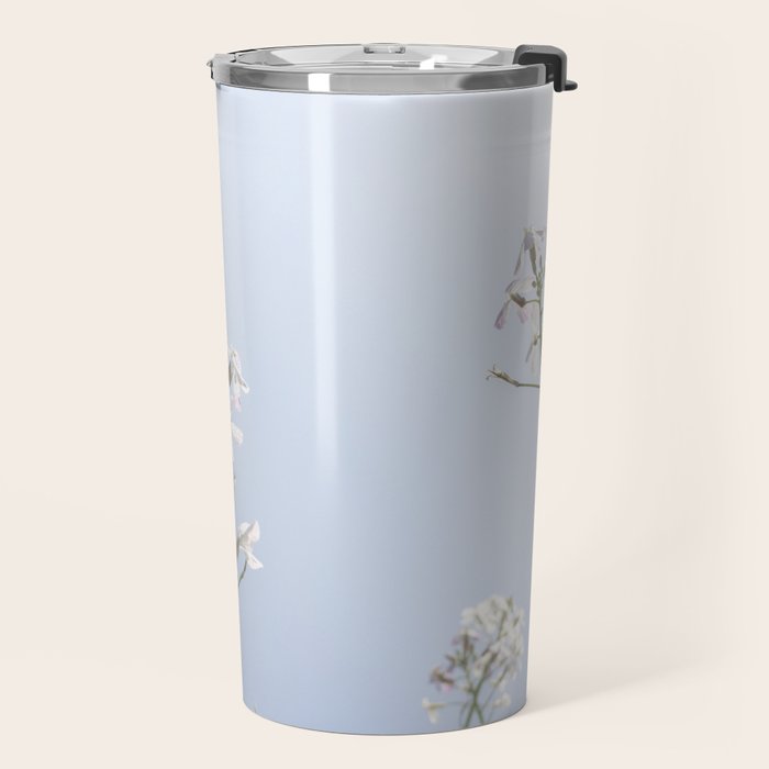 Wild radish flowers in a meadow in the spring against a clear blue sky - nature photography Travel Mug Gallery Image 2