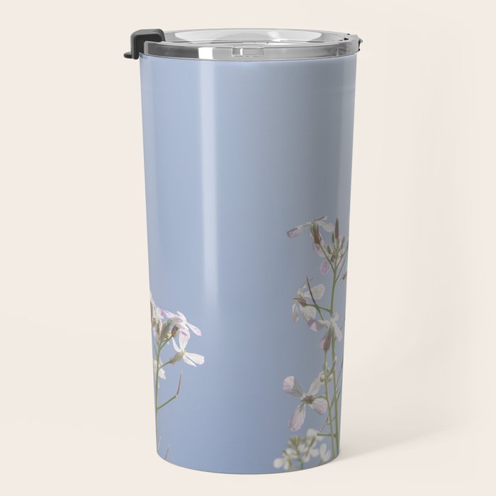Wild radish flowers in a meadow in the spring against a clear blue sky - nature photography Travel Mug Gallery Image 3