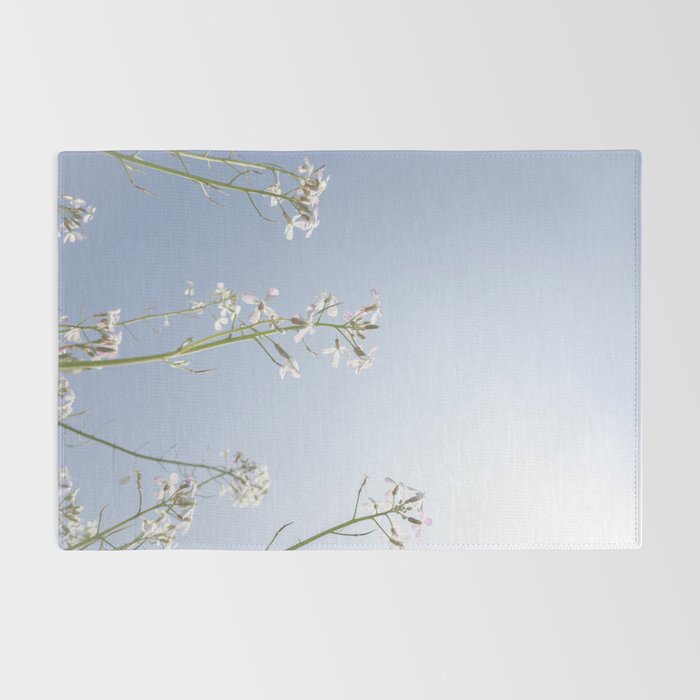 Wild radish flowers in a meadow in the spring against a clear blue sky - nature photography Rug Gallery Image 2