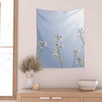 Wild radish flowers in a meadow in the spring against a clear blue sky - nature photography Wall Tapestry Gallery Image 2