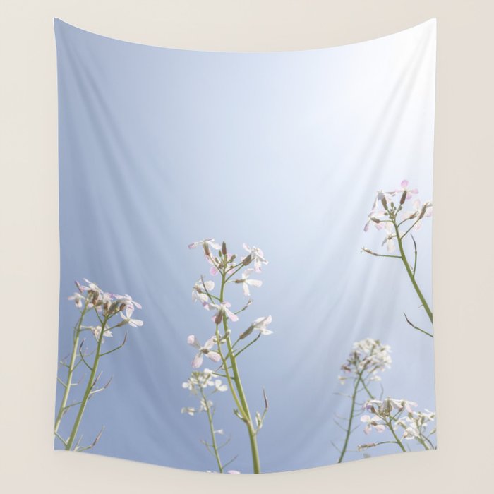 Wild radish flowers in a meadow in the spring against a clear blue sky - nature photography Wall Tapestry Gallery Image 4