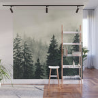 Thick pine forest in the descending mist Wall Mural Gallery Image 1
