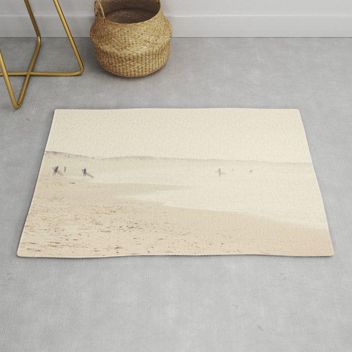 beach photography - minimal surfers and ocean print Rug Gallery Image 1