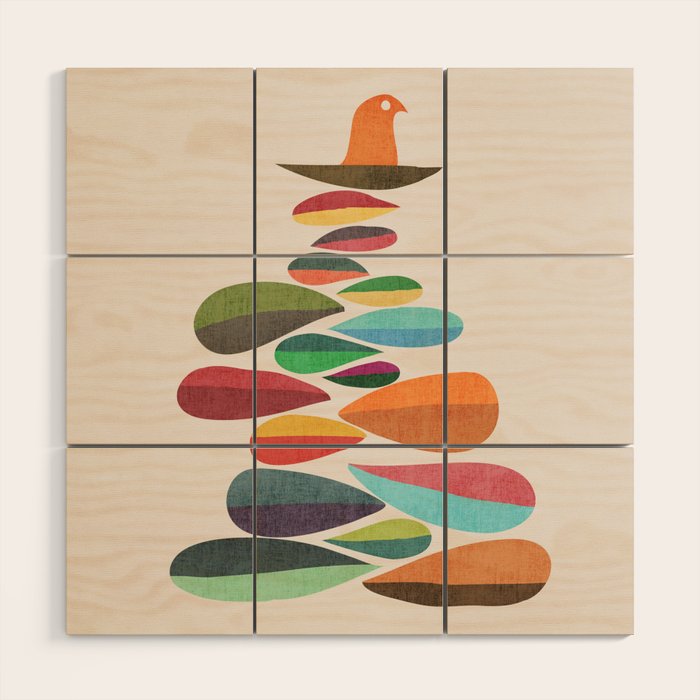 Bird nesting on top of pebbles hill Wood Wall Art Gallery Image 1