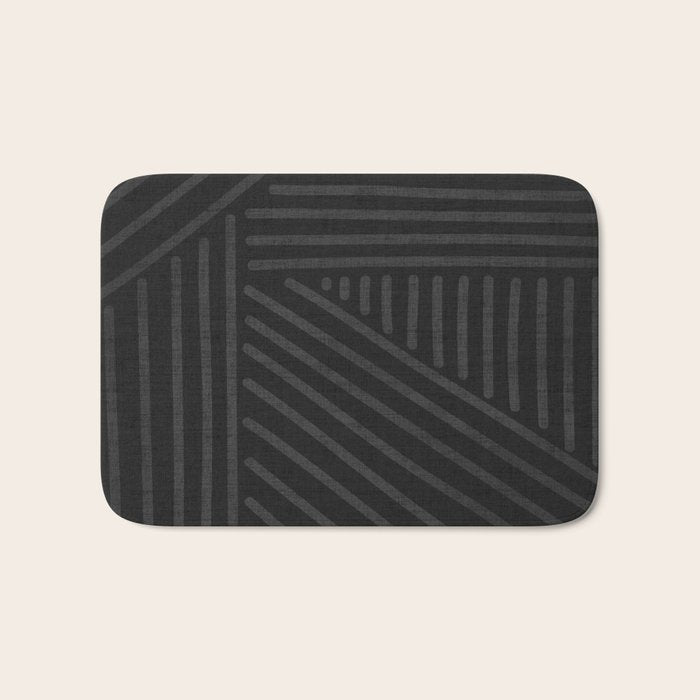 Charcoal grey line work on textured cloth - abstract geometric pattern Bath Mat Gallery Image 1