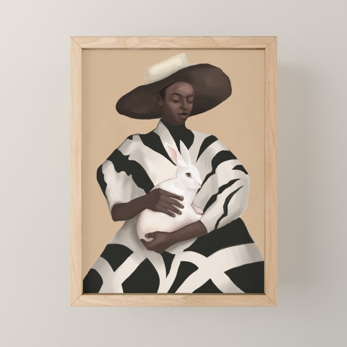 Woman in Stripes Holding a White Rabbit Mini Art Print Gallery Image 1