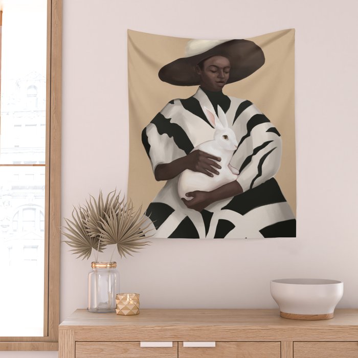 Woman in Stripes Holding a White Rabbit Wall Tapestry Gallery Image 2