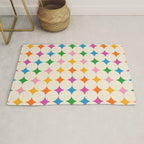 Retro Rainbow Starburst Grid - Playful Geometric on Cream Background Rug Gallery Image 1