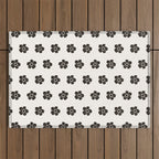 Abstract Black Floral Pattern Outdoor Rug Gallery Image 1