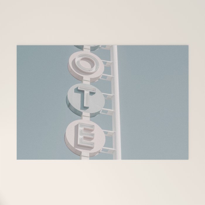 Motel Sign Photo Art Print | Light Blue Pastel Sky Summer Photograph Welcome Mat Gallery Image 1