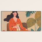 Woman with cat in living room in warm earth tones Desk Mat Gallery Image 3