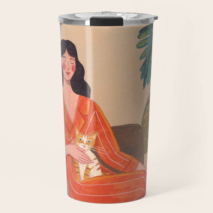 Woman with cat in living room in warm earth tones Travel Mug Gallery Image 1
