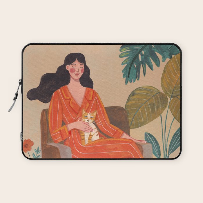 Woman with cat in living room in warm earth tones Laptop Sleeve Gallery Image 1