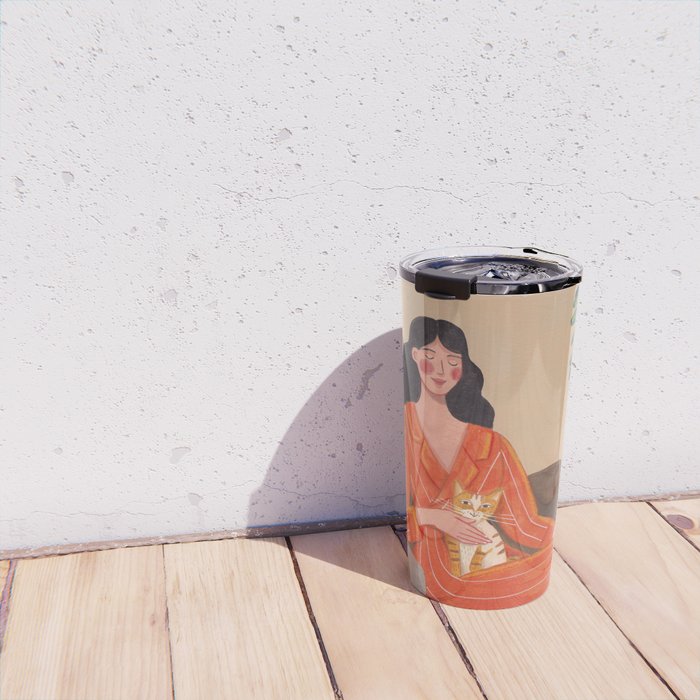 Woman with cat in living room in warm earth tones Travel Mug Gallery Image 4