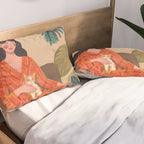 Woman with cat in living room in warm earth tones Pillow Sham Gallery Image 2