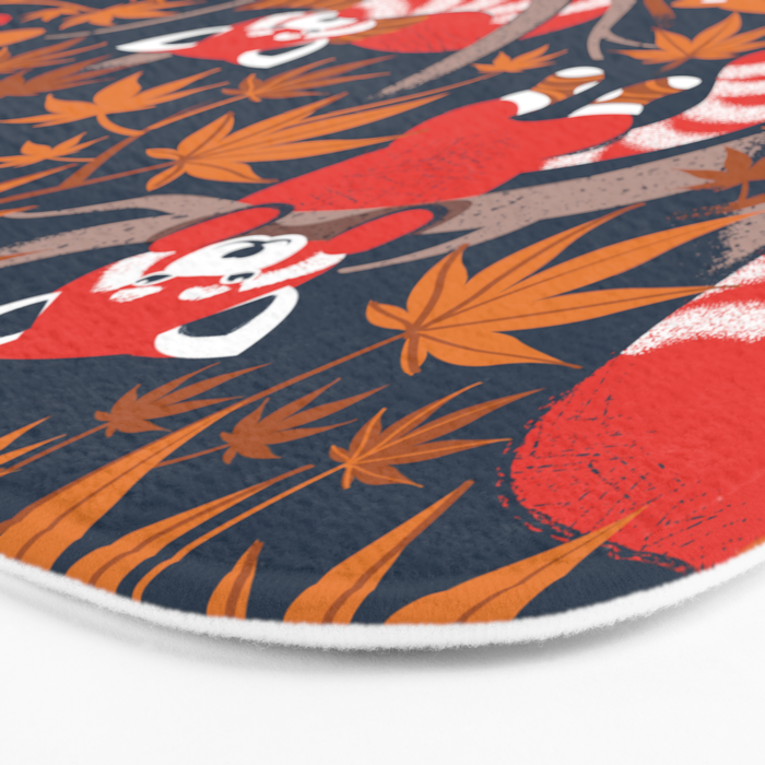 Red panda blending with the foliage // navy background red cozy animals fog brown taupe tree branches orange acer leaves Bath Mat Gallery Image 3