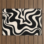 Retro Liquid Swirl Abstract Pattern 3 in Black and Almond Cream Outdoor Rug Gallery Image 1