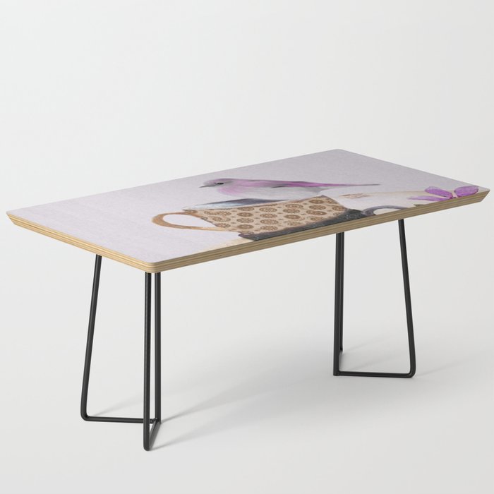 Bird in tea cup Coffee Table Gallery Image 1
