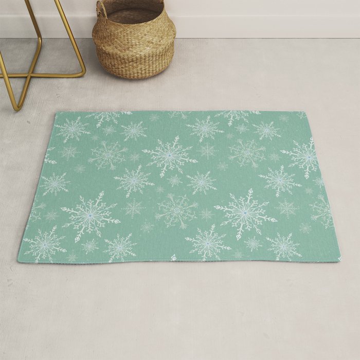 Elegant Winter Snowflake Pattern on Mint Green Background Rug Gallery Image 1