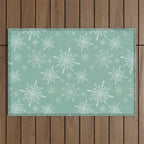 Elegant Winter Snowflake Pattern on Mint Green Background Outdoor Rug Gallery Image 1