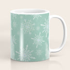 Elegant Winter Snowflake Pattern on Mint Green Background Coffee Mug Gallery Image 1
