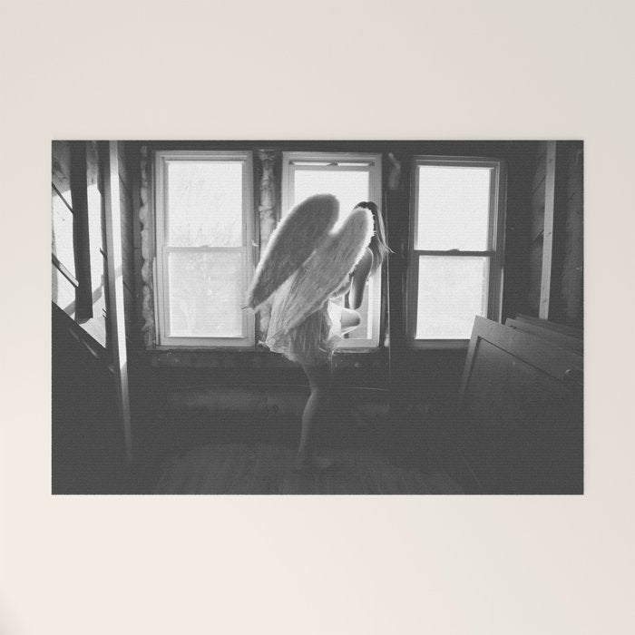 Caught Her Sneaking Out the Bathroom Window female angel black and white photograph - photography - photographs wall decor Welcome Mat Gallery Image 1