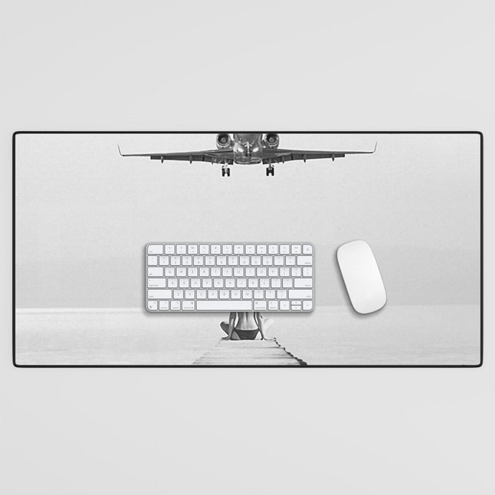 Steady As She Goes 6; aircraft coming in for an island landing female in bikini black and white photography - photographs - photograph Desk Mat Gallery Image 1