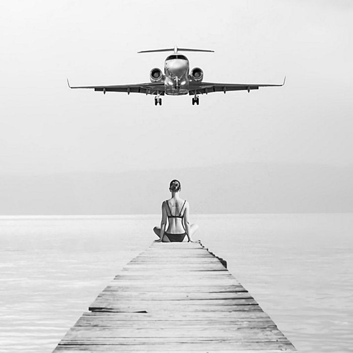 Steady As She Goes 6; aircraft coming in for an island landing female in bikini black and white photography - photographs - photograph Coffee Mug Gallery Image 2
