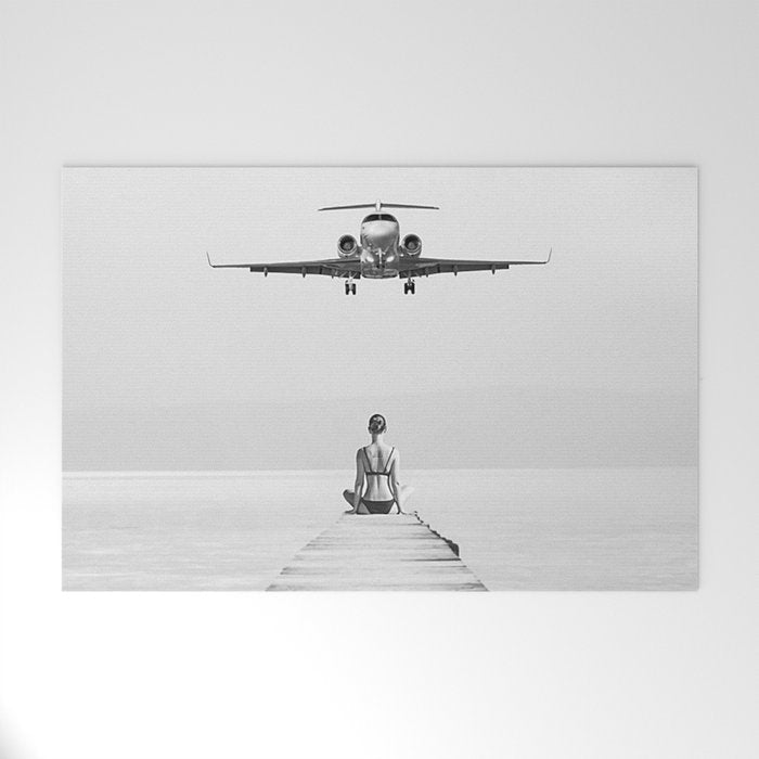 Steady As She Goes 6; aircraft coming in for an island landing female in bikini black and white photography - photographs - photograph Welcome Mat Gallery Image 1