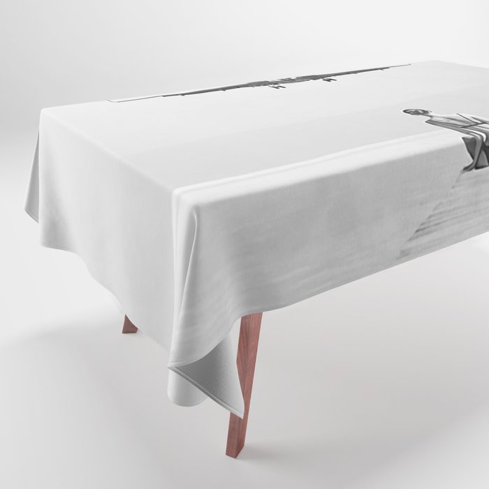 Steady As She Goes 6; aircraft coming in for an island landing female in bikini black and white photography - photographs - photograph Tablecloth Gallery Image 1