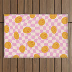 Groovy Smiley Faces on Pastel Pink Twisted Checkerboard Outdoor Rug Gallery Image 1