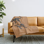 Black cheetah in sundial brown background  Throw Blanket Gallery Image 1