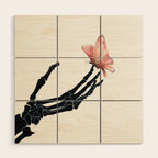 Butterfly on Skeleton Hand Wood Wall Art Gallery Image 1