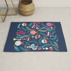 Mexican Christmas Tree // blue background blue pine leaves multicoloured holiday decorations pan dulce balls cacti hearts birds pom-pom garland pinatas santa claus conchas donuts Rug Gallery Image 1