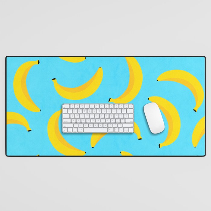 Minimal bold and vibrant banana pattern yellow on blue Desk Mat Gallery Image 1