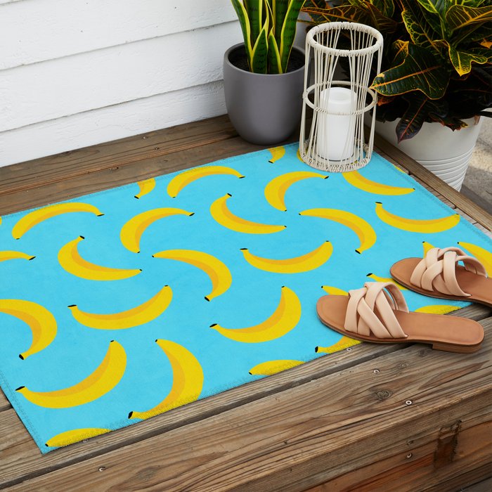 Minimal bold and vibrant banana pattern yellow on blue Outdoor Rug Gallery Image 2