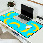 Minimal bold and vibrant banana pattern yellow on blue Desk Mat Gallery Image 2