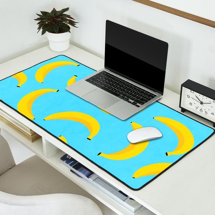 Minimal bold and vibrant banana pattern yellow on blue Desk Mat Gallery Image 2