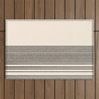 Organic Stripes - Minimalist Textured Line Pattern in Black and Almond Cream Outdoor Rug Gallery Image 1