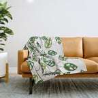 Monstera obliqua interior plant Throw Blanket Gallery Image 1