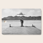 Steady as she goes girl in bikini on a dock with plane landing black and white photograph Cutting Board Gallery Image 1