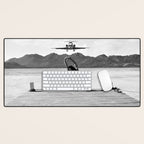 Steady as she goes girl in bikini on a dock with plane landing black and white photograph Desk Mat Gallery Image 1
