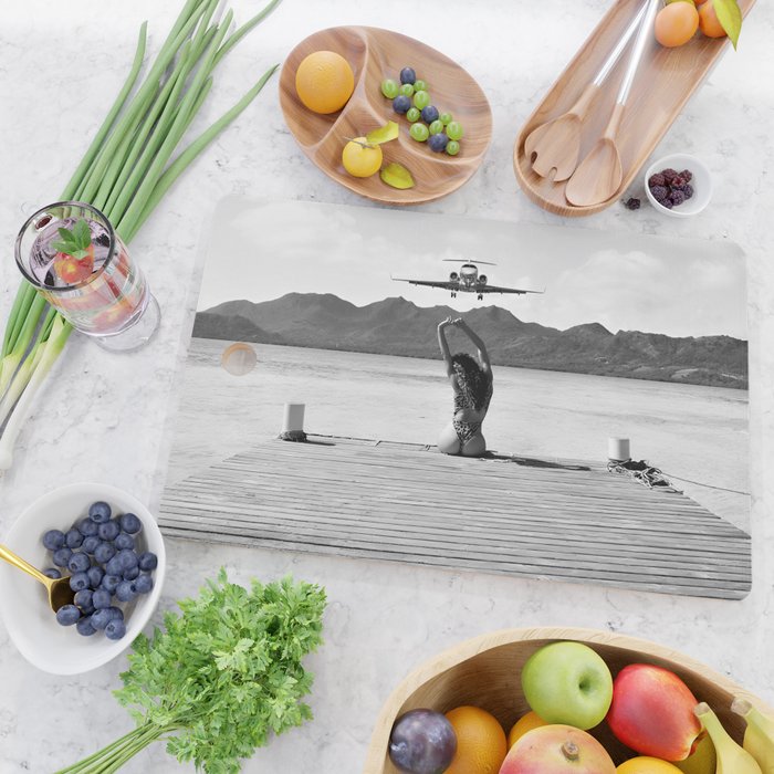 Steady as she goes girl in bikini on a dock with plane landing black and white photograph Cutting Board Gallery Image 2
