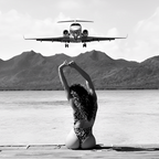 Steady as she goes girl in bikini on a dock with plane landing black and white photograph Coffee Mug Gallery Image 2
