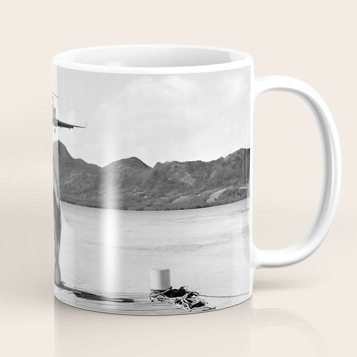 Steady as she goes girl in bikini on a dock with plane landing black and white photograph Coffee Mug Gallery Image 1