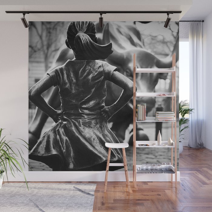 Fearless Girl facing down the Charging Bull statue of Wall Street black and white photography Wall Mural Gallery Image 1