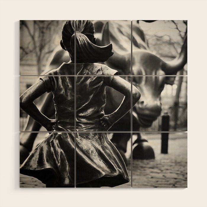 Fearless Girl facing down the Charging Bull statue of Wall Street black and white photography Wood Wall Art Gallery Image 1