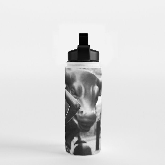 Fearless Girl facing down the Charging Bull statue of Wall Street black and white photography Water Bottle Gallery Image 2