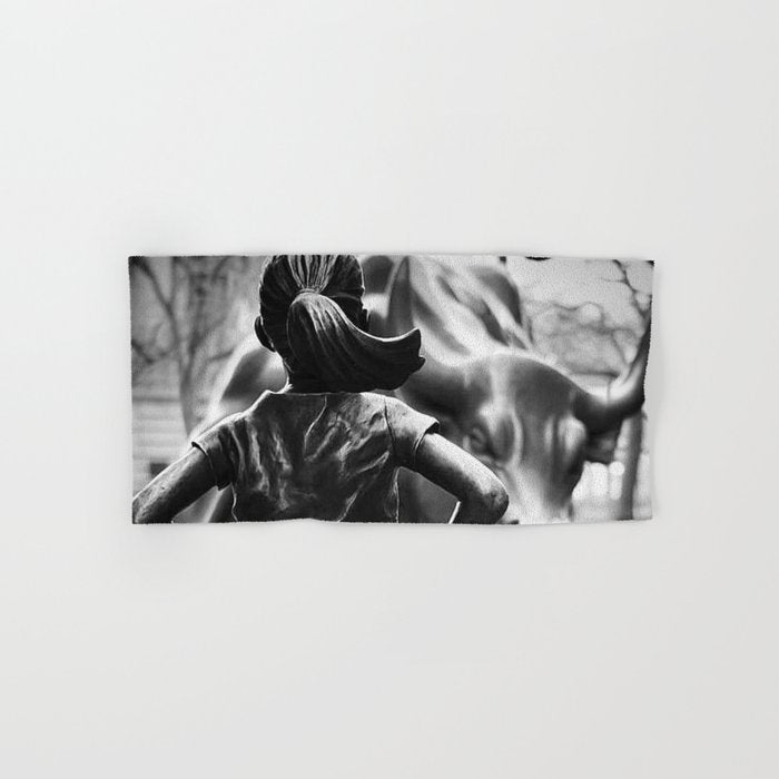 Fearless Girl facing down the Charging Bull statue of Wall Street black and white photography Bath Towel Gallery Image 1