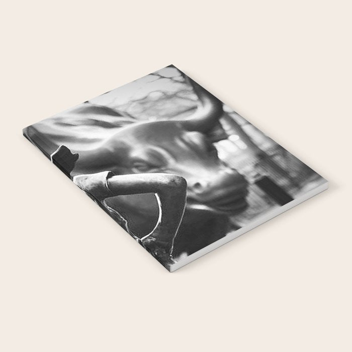 Fearless Girl facing down the Charging Bull statue of Wall Street black and white photography Notebook Gallery Image 1